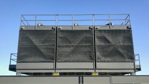 photo: PreVent system installed on the outdoor face of a cooling tower