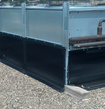 Cottonwood Screens Protect Refrigerated Case Condenser